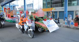 Pawai mobil hias mewarna puncak HUT Kota Palembang, Minggu (18/6/2023). Foto : Sumselheadline/pitria.
