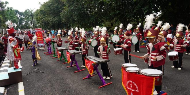 Lomba Marching Concert Gubernur Championship tahun 2024. Kegiatan ini berlangsung di Halaman Rumah Dinas Gubernur, Griya Agung Palembang, Sumatera Selatan, Sabtu (9/3/2024). Foto: Humas Pemprov Sumsel.