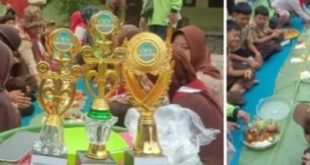 Para guru dan siswa SDN Sukamaju, Sungai Lilin, Muba menggelar nasi tumpeng. Foto: Dok SDN 1 Suakamaju.