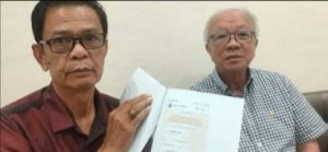 Fahmi Raghip,SH,MH dan kliennya , Alex Suherman Salim. Foto: Sumselheadline/Ela.