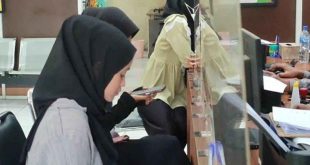 Nisfa Rahmadhini, mahasiswi di Palembang , melapor kepolisi karena tertipu iklan kosan, Minggu (18/5/2024). Foto: Sumselheadline/Ela.