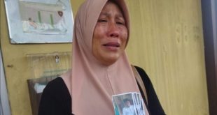 Nurhasanawati (44), warga Kota Agung, Kabupaten Lahat, melapor ke Polrestabes Palembang atas hilangnua suaminya, Kamis (2/5/2024). Foto: Sumselheadline/Ela.