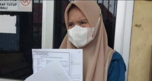NI yang rugi Rp 31 Juta melapor ke polisi, Kamis (9/5/2024). Foto: Sumselheadline/Ela.