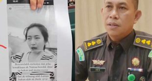 Jaksa penunjukkan foto Alnaura yang dinyatakan buron kasus investasi bodong. Foto: Dok Kejaksaan Tinggi Sumsel.