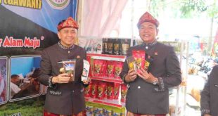 Pj Gubernur Sumsel, Agus Fatoni saat mempromosikan kopi produksi Kota Pagaralam, Jumat (21/6/2024). Foto: Humas Pemprov Sumsel.