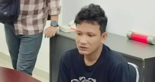 Bejan, tersangka pemerkosa lima anak saat dibawa ke Kejati Sumsel, Selasa (11/6/2024). Foto: Sumselheadline/Ela.