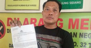 Hendra, ayah siswa di Palembang yang mengalami perundungan. Foto: Sumselheadline/Ela.