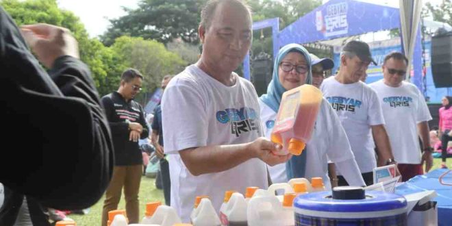 Sekda Muba, Apriyadi di sela senam dan launching Gebyar QRIS di halaman Pemkab Muba. Foto: Kominfo Muba.