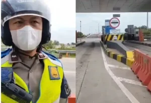 Polisi yang menghentikan mobil di depan gerbang tol Keramasan, Palembang. Foto: screenshot medsos.