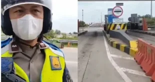 Polisi yang menghentikan mobil di depan gerbang tol Keramasan, Palembang. Foto: screenshot medsos.