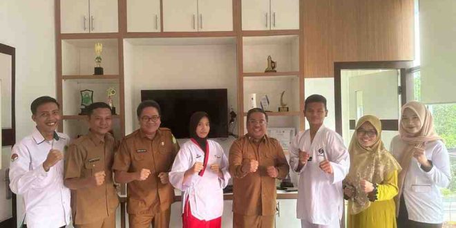 Siswa MAN 1 Musi Banyuasin, Alvina Raisya dan Wahyu Ibrahim, telah berhasil mengukir prestasi gemilang di ajang Indonesia Inter Student Taekwondo Championship (IISTC) 2024. Foto: Kominfo Muba.