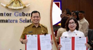 Penjabat Gubernur Sumatera Selatan (Sumsel) Elen Setiadi bersama Kepala Kantor Wilayah Badan Pertanahan Nasional Provinsi Sumsel Asnawati menandatangani Kesepakatan bersama bidang pertanahan, Selasa (4/2/2025). Foto: Humas Pemprov Sumsel.