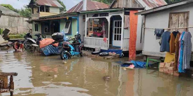 Suasana banjir di salah titik Kota Palembang. Foto: IST