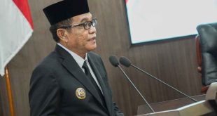 Bupati Muba, HM Toha saat pidato perdana pasca dilantik di DPRD Muba, Senin (3/3/2025). Foto: Kominfo Muba.