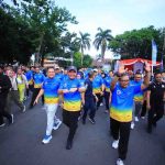 Gubernur Sumsel, Herman deru ikut jalan santai dalam rangka HUT IKA UII. Foto: Humas Pemprov Sumsel.