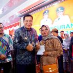 pkm Bupati Muba, HM Toha saat meluncurkan Program Keluarga Maju di Pendopoan Griya Bumi Serasan Sekate, Kamis (18/12/2025). Foto: KOminfo Muba.