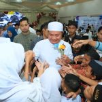 Gubernur Sumatera Selatan (Sumsel) Dr. H. Herman Deru didampingi anggota DPD RI Ratu Tenny Leriva menghadiri kegiatan Yatim Fest 2026 di Rambang Semesta, Palembang, Minggu (8/3/2026). Foto: Humas Pemprov Sumsel.