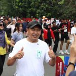 Adi Zahri, Kadis Kominfo Palembang, tampak ikut meramaikan CFD, Minggu (24/5/2026). Foto: Kominfo Palembang.