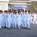 Pasukan pengibar bendera saat upacara hari lahir Pancasila, Senin (1/6/2026). Foto: Kominfo Palembang.