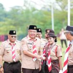 Wakil Gubernur Sumatera Selatan (Sumsel) H. Cik Ujang saat usai membuka Jambore Daerah (Jamda) IX Gerakan Pramuka Sumsel Tahun 2026 yang diselenggarakan Kwartir Daerah (Kwarda) Gerakan Pramuka Sumsel di lapangan Utama Bumi Perkemahan Gandus, Palembang, Kamis (18/6/2026). Foto: Humas Pemprov Sumsel.