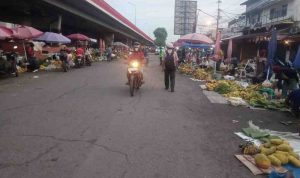 Suasana kawasan 7 Ulu, bawah Jembatan Ampera, Palembang. Foto: IST