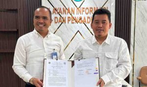 putih Guna mendukung transformasi pengelolaan keuangan negara yang semakin modern, transparan, dan akuntabel, Kantor Pertanahan (Kantah) Kabupaten Merangin, Jambi, resmi menjalin kerja sama dengan PT Bank Rakyat Indonesia (Persero) Tbk Kantor Cabang Bangko. Foto: IST