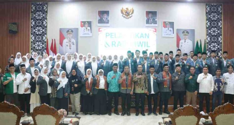 Pelaksana Harian (Plh) Sekretaris Daerah Kota Palembang, Sulaiman Amin saat menghadiri pelantikan dan Rapat Pimpinan Wilayah (Rapimwil) Pengurus Pimpinan Cabang Ikatan Pelajar Nahdlatul Ulama (IPNU), serta Ikatan Pelajar Putri Nahdlatul Ulama (IPPNU) Provinsi Sumatera Selatan Masa Khidmat 2025–2028 di Rumah Dinas Walikota Palembang, Jumat (21/8 2026). Foto: Kominfo Palembang.