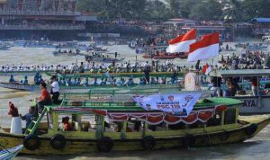 Suasana lomba perahu bidar di Sungai Musi, Palembang, Senin (17/8/2026). Foto: Kominfo Palembang.