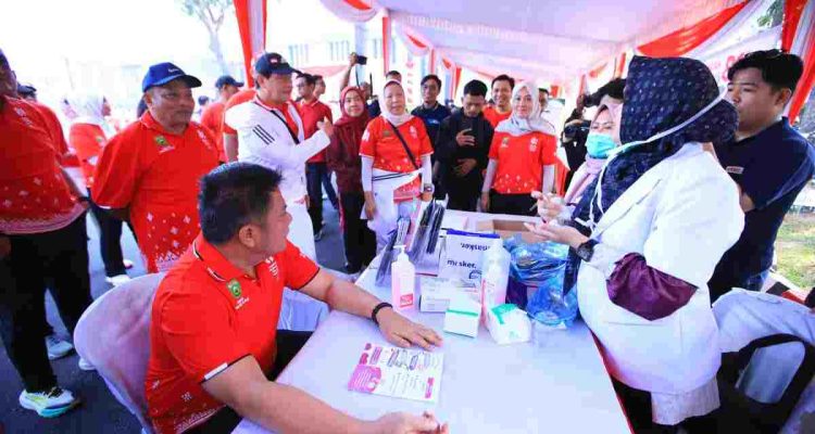 Gubernur Sumsel, Herman Deru yang hadir di sejumlah kegiatan perayaan HUT RI di halaman Pemprov Sumsel, Minggu (23/8/2026). Foto: Humas Pemprov Sumsel.