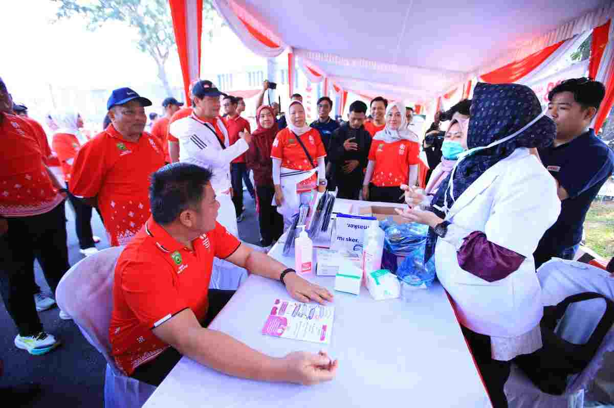 Gubernur Sumsel, Herman Deru yang hadir di sejumlah kegiatan perayaan HUT RI di halaman Pemprov Sumsel, Minggu (23/8/2026). Foto: Humas Pemprov Sumsel.