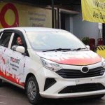Taksi Maxim berdekorasi merah putih. Bagi yang kebetulan dapat order mobil ini, maka perjalannya gratis. Foto: IST/DOK Maxim.