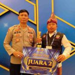 Lurah Ngulak, Zulham saat menerima tropi juara pada acara Awarding Day 2026 di Gedung The Tribrata Dharmawangsa, Jakarta Selatan, Selasa (11/8/2026) malam. Foto: Kominfo Muba.