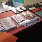 Barang bukti yang diamankan penyidik Polda Sumsel atas OTT terhadap sejumlah ASN Diknas Banyuasin. Foto: IST/sripoku.com.