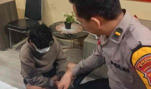Pelaku IN, yang diamankan di Polsek Sukarame. Foto: Dok Polisi.