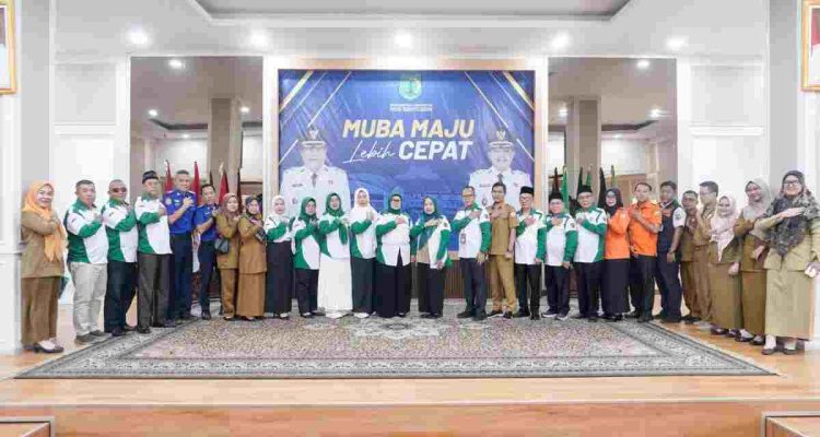 Ketua Forum Kabupaten Musi Banyuasin Sehat sekaligus Ketua TP PKK Kabupaten Muba, Hj Patimah Toha Tohet saat memimpin Rapat Koordinasi Persiapan Verifikasi Dokumen KKS Tahun 2027 dan Evaluasi Sembilan Tatanan KKS, Senin (20/10/2026). Foto: Kominfo Muba.